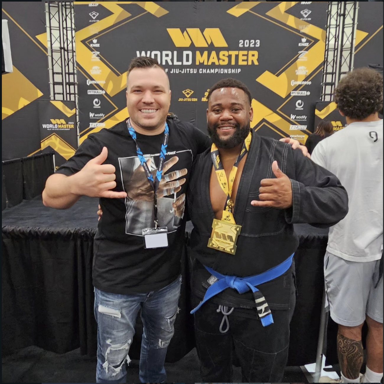 Ethan Brinkmann with a teammate at the IBJJF World Master Jiu-Jitsu Championship